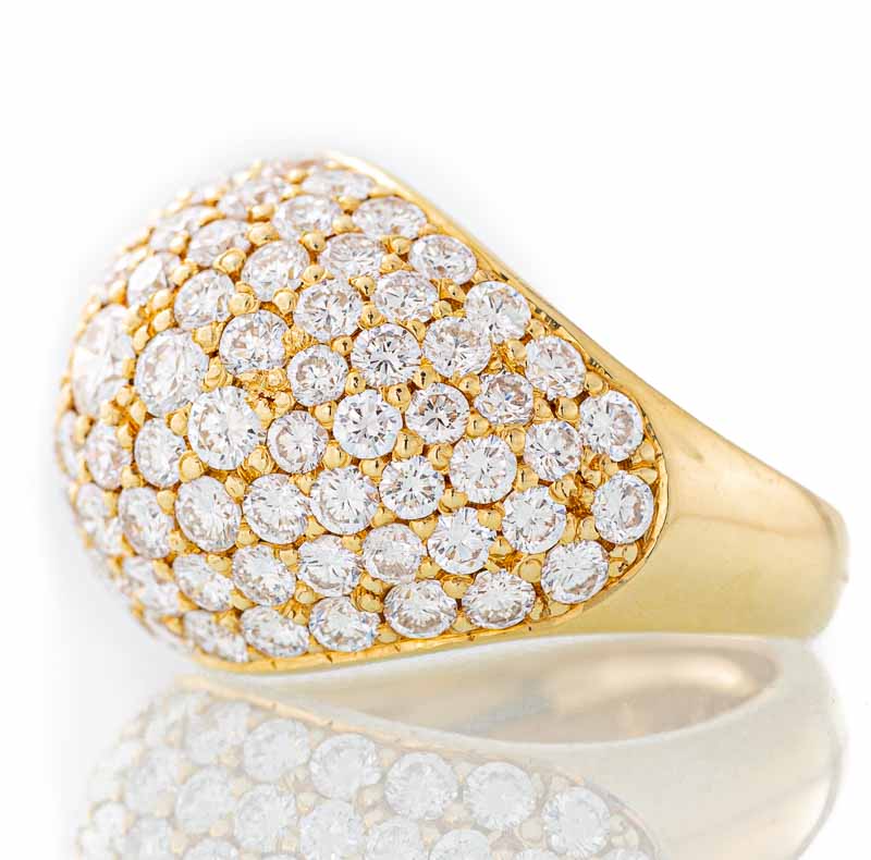 Infinite diamond dome ring in 18k gold.