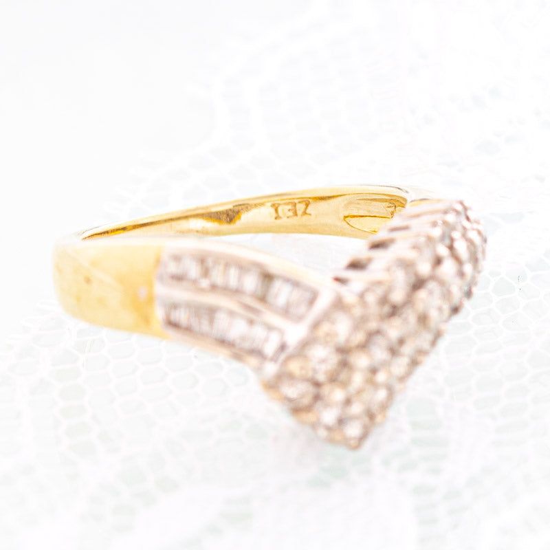 Flying V diamond ring in 10k yellow gold.