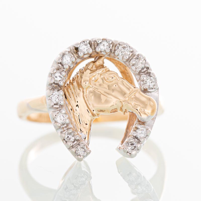Horseshoe diamond ring in 14k yellow gold.