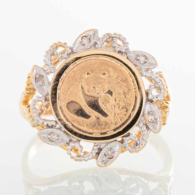 Panda Coin diamond ring in 10k yellow gold.