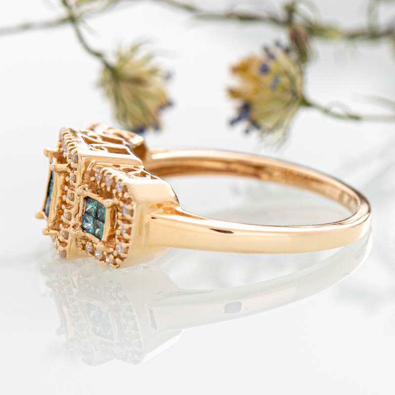 Triple geometric enhanced blue diamond halo ring with diamonds in 14k yellow gold.