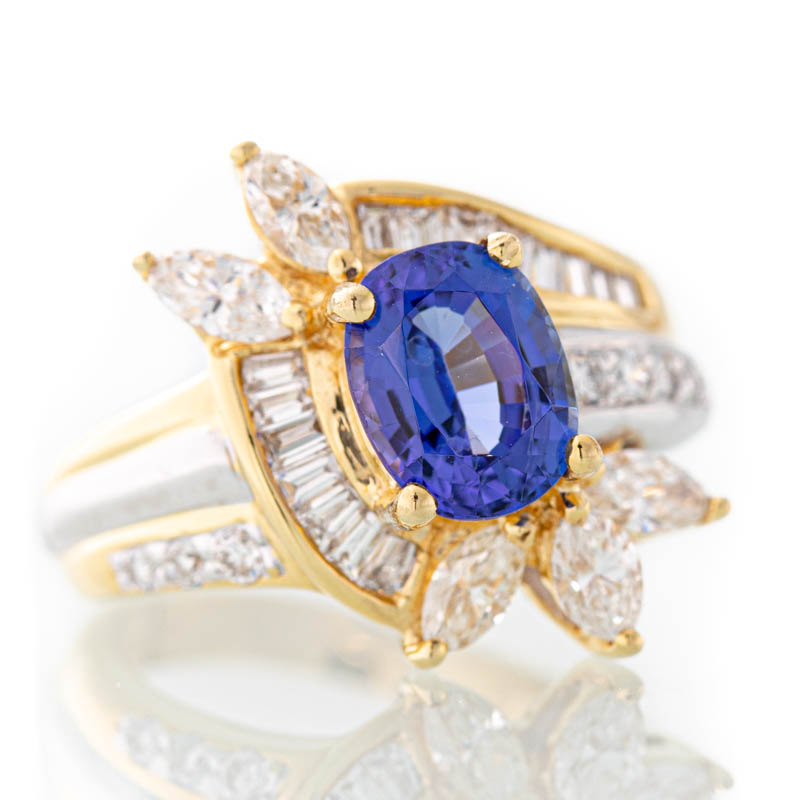 Electric tanzanite and diamond ring in 18k yellow gold and platinum.