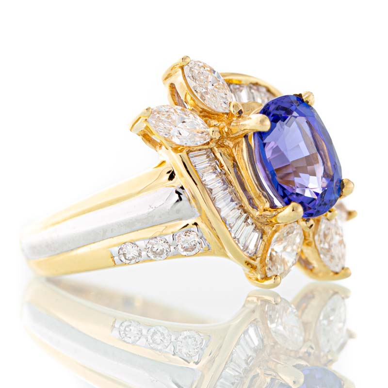 Electric tanzanite and diamond ring in 18k yellow gold and platinum.