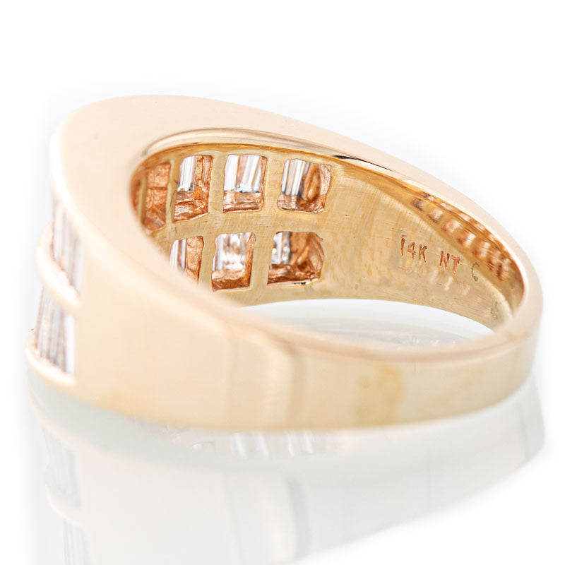 Story Baguette diamond ring in 14k gold.